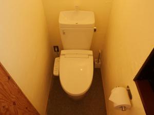 a bathroom with a toilet in a small room at HITOYANE guesthouse-1日1組限定- in Aizuwakamatsu +46 photos