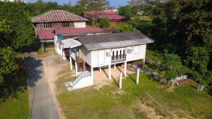 an overhead view of a house on a hill at Homestay Kota Bharu Tok Paloh in Kota Bharu