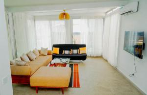 Posezení v ubytování Studio cozy Mermoz