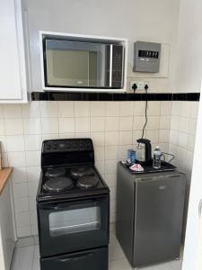 Η κουζίνα ή μικρή κουζίνα στο Wasaa Anasa at Norton Manor