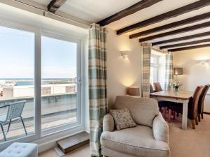 Posezení v ubytování Quay Cottage