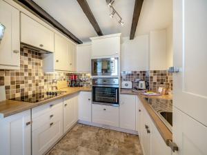 Kuchyň nebo kuchyňský kout v ubytování Quay Cottage + 13 fotografií