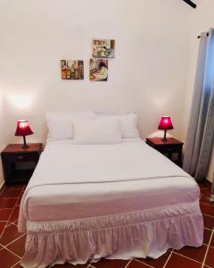 Ένα ή περισσότερα κρεβάτια σε δωμάτιο στο La Posada de Jose Antonio