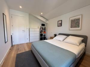 a bedroom with a large bed and a closet at Belle maison 10 pers, piscine et jardin à Urrugne - FR-1-239-1146 in Urrugne +22 photos