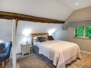 Postel nebo postele na pokoji v ubytování Home Farm Barn