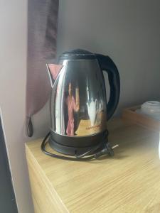 Příslušenství pro přípravu čaje a kávy v ubytování Đảo Ngọc Homestay - Grand World Phú Quốc + 25 fotografií