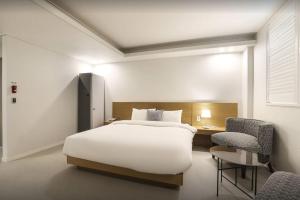 Voodi või voodid majutusasutuse E&A Hotel toas