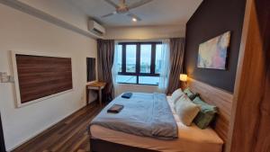 Postel nebo postele na pokoji v ubytování H&W Sunway Onsen Suites Services Tambun Ipoh S-07-05 + 55 fotografií