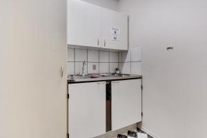 Kuchyň nebo kuchyňský kout v ubytování Hotel Varde