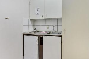 Kuchyň nebo kuchyňský kout v ubytování Hotel Varde