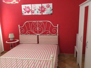 Ένα ή περισσότερα κρεβάτια σε δωμάτιο στο B&B in Residence "...a due passi dalla Scala dei Turchi"