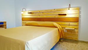 Postel nebo postele na pokoji v ubytování Casa della Nonna Polignano a mare