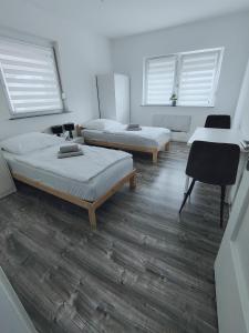 Ένα ή περισσότερα κρεβάτια σε δωμάτιο στο 3 Zimmer Wohnung in Altendorf