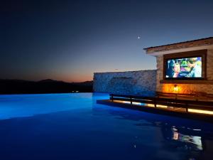 Πισίνα στο ή κοντά στο Sunset Stone Villa