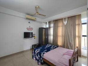 Μια τηλεόραση ή/και κέντρο ψυχαγωγίας στο Green Garden Apartments
