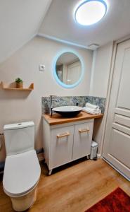 Koupelna v ubytování Cosy Color