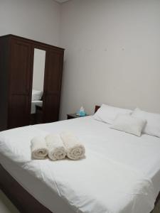 Postel nebo postele na pokoji v ubytování فيلا للايجار فى منتجع المونت جلالة