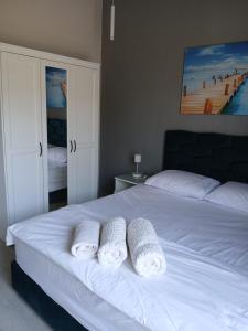 Postel nebo postele na pokoji v ubytování فيلا للايجار فى منتجع المونت جلالة + 4 fotografie