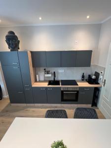 Η κουζίνα ή μικρή κουζίνα στο Amadeus Apartment