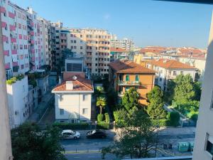 a view of a city with buildings and cars at Venice Day Apartment in Mestre