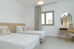 Ένα ή περισσότερα κρεβάτια σε δωμάτιο στο Lumina Sense Villas +113 φωτογραφίες