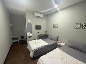 Postel nebo postele na pokoji v ubytování Ab rich Amore Hotel