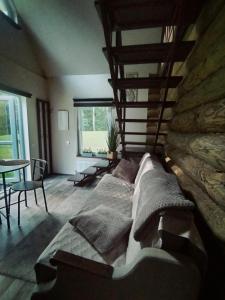 Una cama o camas en una habitación de Ozolsala