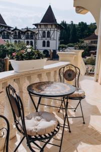 Μπαλκόνι ή βεράντα στο Villa Ludwig Шаян +6 φωτογραφίες