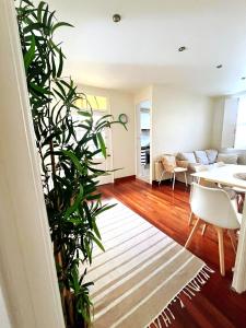 a living room with a couch and a table at Casabonita Santander in Santander
