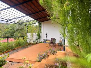 Κήπος έξω από το Casa Rosa Homestay