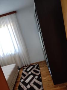 Ένα ή περισσότερα κρεβάτια σε δωμάτιο στο Blazuj House 2 Bedrooms