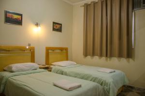 Hotel Pousada Do Leão客房内的一张或多张床位