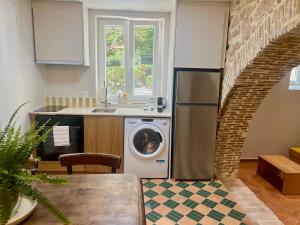 Kuchyň nebo kuchyňský kout v ubytování Corcyra Collection