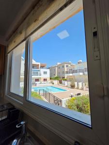 Πισίνα στο ή κοντά στο Ithaki Garden Cozy 1BR Apartment Universal