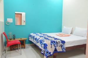 Katil atau katil-katil dalam bilik di Hamsa Home Stay +22 gambar