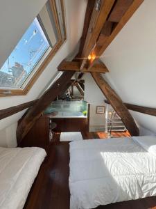Postel nebo postele na pokoji v ubytování Appartement atypique