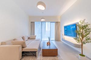 Χώρος καθιστικού στο New 1BR Burj view- Infinity Pool - Dubai Mall