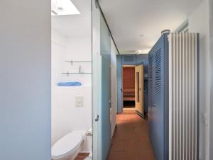a bathroom with a toilet and a sink at Havelhaus Werder in Glindow