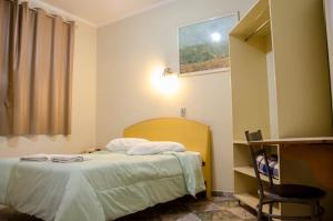 Hotel Pousada Do Leão客房内的一张或多张床位