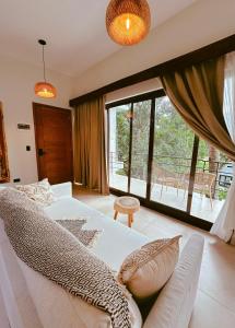 Ένα ή περισσότερα κρεβάτια σε δωμάτιο στο Casa Caona +16 φωτογραφίες