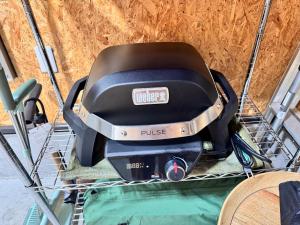 a grill sitting in a shopping cart at Garage Base TATEYAMA in Tateyama