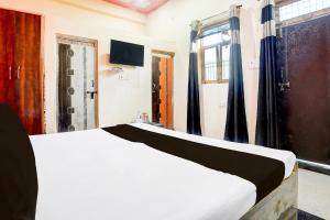 Ένα ή περισσότερα κρεβάτια σε δωμάτιο στο Hotel O AnubhavRooms