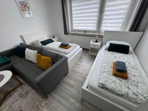 Posezení v ubytování FeWo Elbo46 mit Balkon, Waschmaschine & Smart TV + 9 fotografií