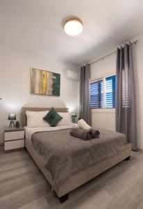 Katil atau katil-katil dalam bilik di Aetheria 3BR +63 gambar