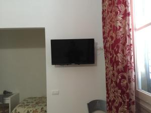 TV o dispositivi per l'intrattenimento presso Locanda Pitti