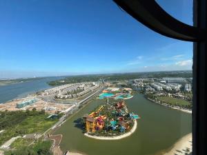 an aerial view of the water park at the disneyland resort at Homestayado in Long Bình