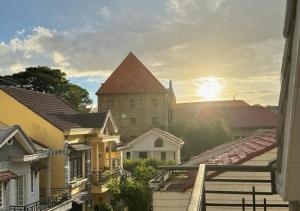 a view from a window of a town with a building at Kha Phat Central Dalat with Local Charm in Xuan An