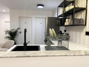 Η κουζίνα ή μικρή κουζίνα στο Koala Hostel Estación +12 φωτογραφίες