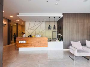 a lobby of a hotel with a reception desk at Louritto Studio Type Condo at Avida Towers Riala Tower 3 in Cebu City +32 photos