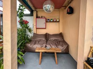 Posezení v ubytování 1BR Studio with Shared Pool, Gym and private Kitchen in Canggu